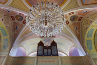 Chandelier and choir in the interior of the church in town Klanjec, Zagorje, Croatia