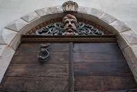 Luneta of the building portal on the square of St George in town Lovran, Kvarner, Croatia