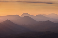 Sunset over hills of croatian Zagorje region and mountains of Slovenia in the background, Zagorje, Croatia