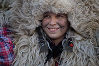 Young member of bellringer group dressed for famous bellringers festival in Matulji in town Rijeka, Croatia