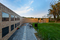 Construction of fence wall with niches for urns on cemetery, Zagreb/Croatia