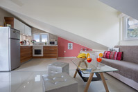 Kitchen and the living room of Abuela's beach house in town Brela, Dalmatia, Croatia