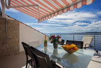 Terrace of Abuela's beach house in coastal town Brela, Dalmatia, Croatia