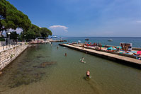 People swimming in front of popular resort Opatija, Kvarner, Croatia