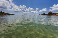 People enjoying on the beach in place Muline, island Ugljan, Dalmatia, Croatia