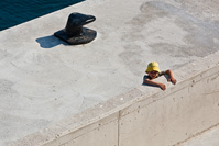 Child waiting for the ship, Dalmatia, Croatia