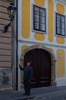 Famous street lamp lighter in Zagreb, Croatia